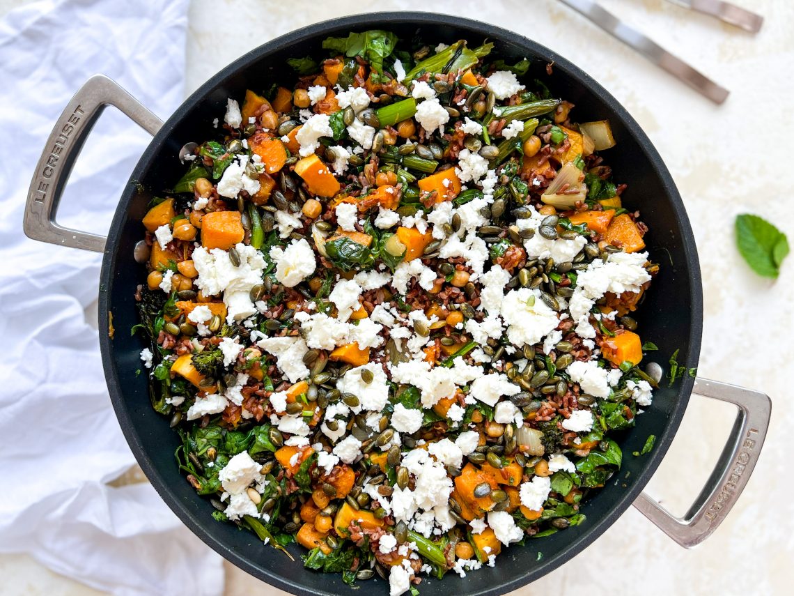 Photograph of Warm Salad of Roast Butternut Squash, Chickpeas and Broccoli with Red Rice, Spinach and Feta Cheese