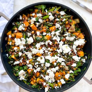 Photograph of Warm Salad of Roast Butternut Squash, Chickpeas and Broccoli with Red Rice, Spinach and Feta Cheese