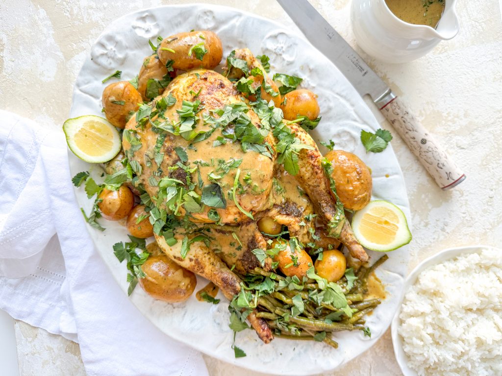 Photograph of One-pot Thai Roast Chicken, New Potatoes and Green Beans with a Red Curry and Peanut Gravy