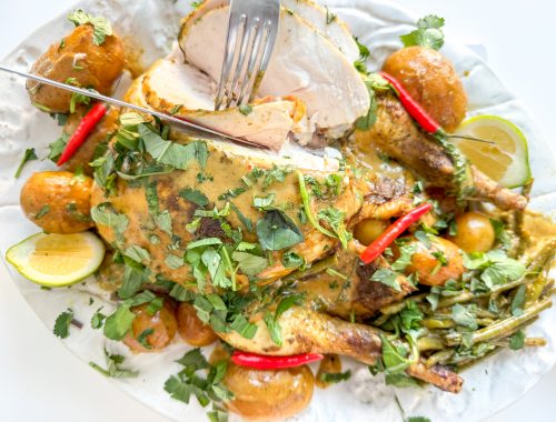 Photograph of One-pot Thai Roast Chicken, New Potatoes and Green Beans with a Red Curry and Peanut Gravy
