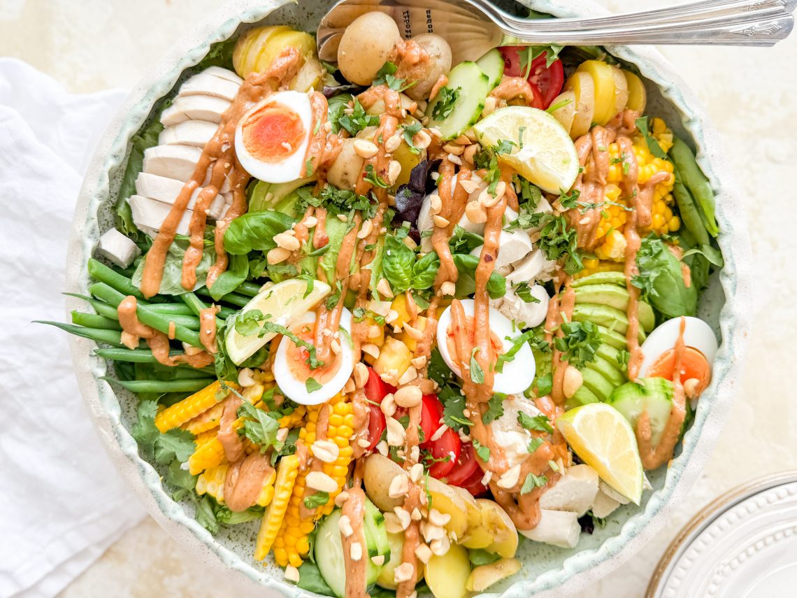 Photograph of Warm Chicken and Potato Platter with Sweetcorn, Mango, Avocado and a Spicy Peanut Dressing