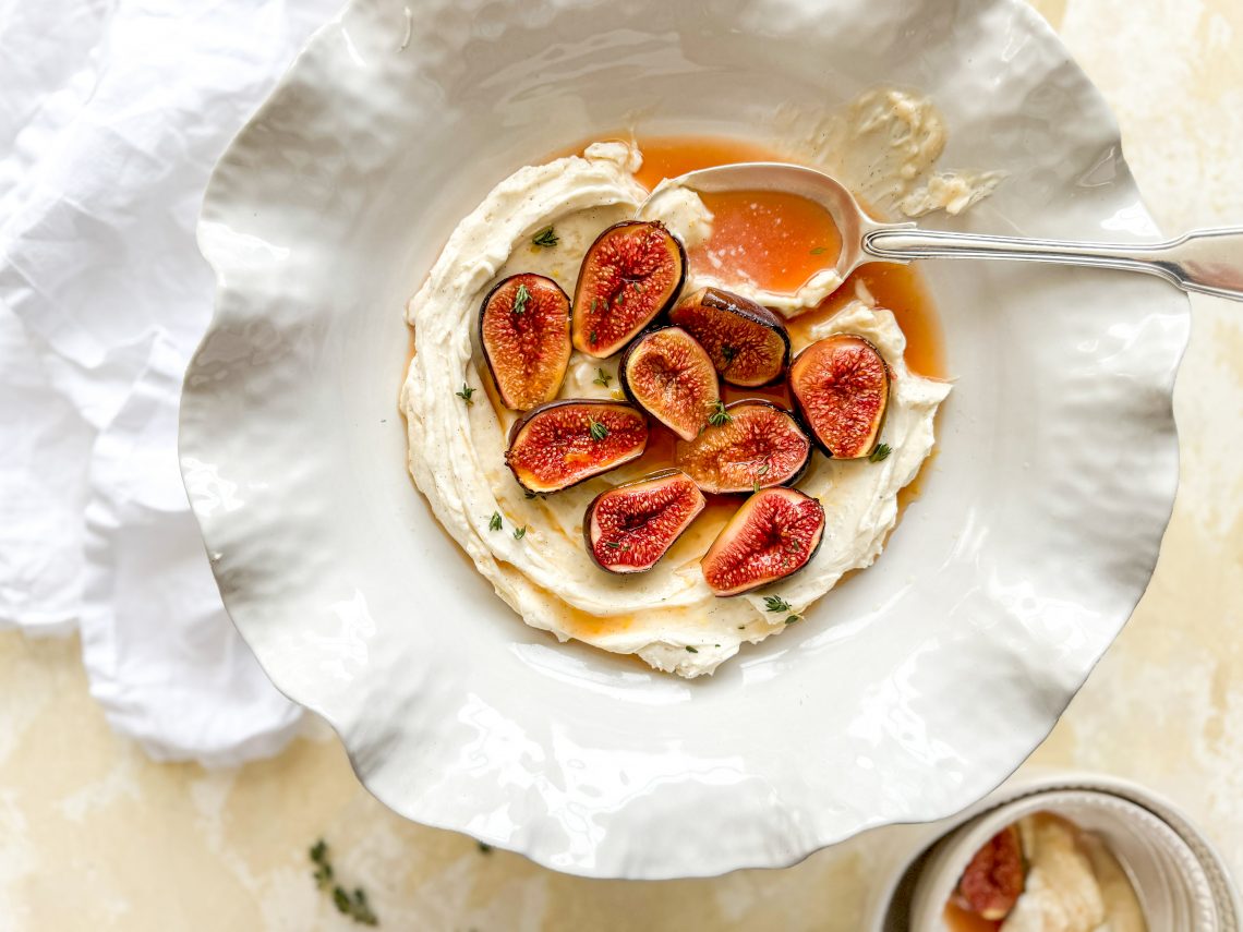 Photograph of Hot Roasted Figs with Fresh Thyme and Whipped Vanilla Ricotta