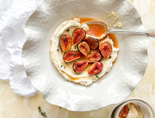 Photograph of Hot Roasted Figs with Fresh Thyme and Whipped Vanilla Ricotta